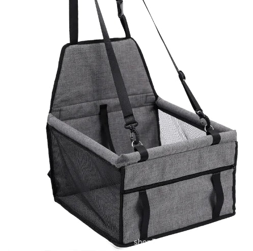 BuddyMutt elevated dog booster car seat in Black and Grey, installed on a car seat