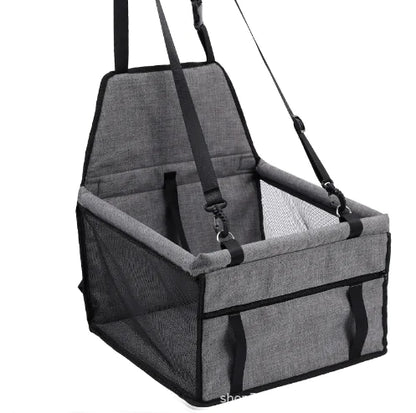 BuddyMutt elevated dog booster car seat in Black and Grey, installed on a car seat