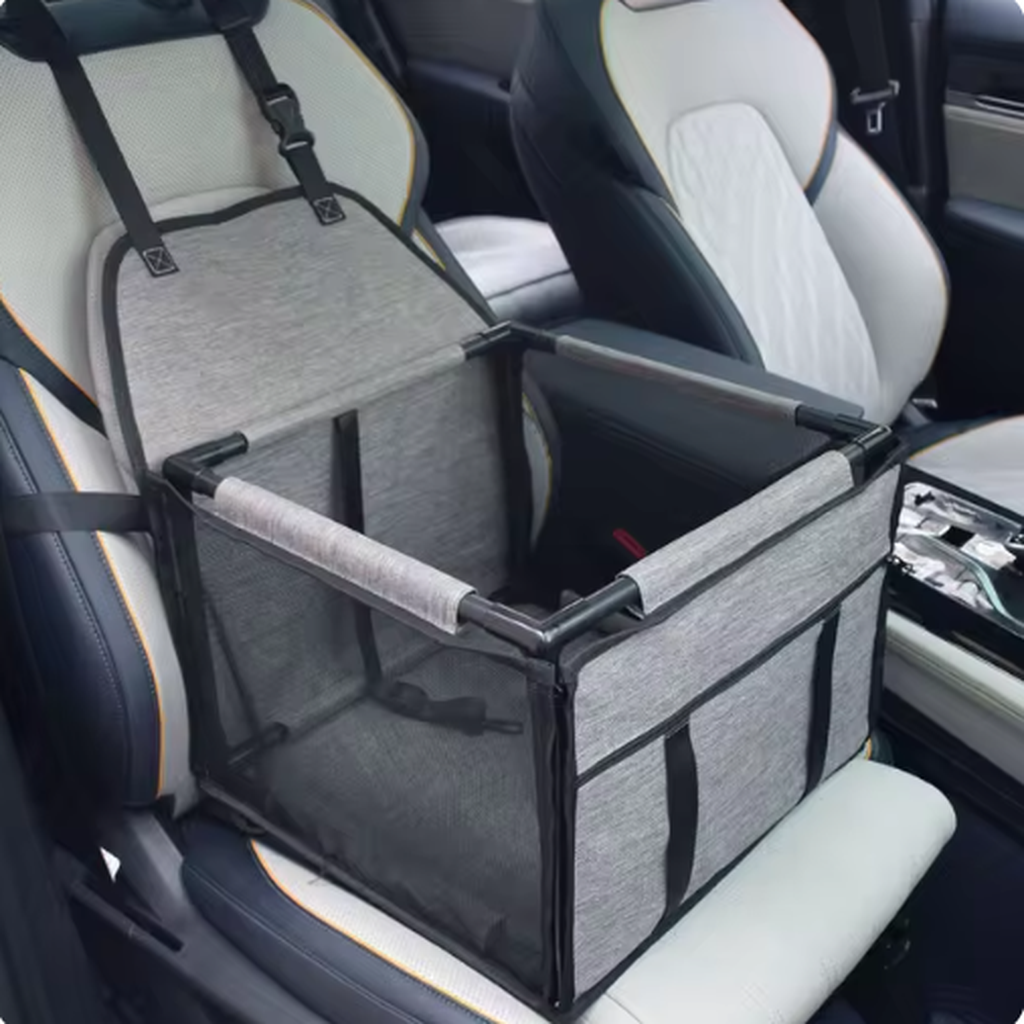 BuddyMutt elevated dog booster car seat in grey, installed on a car seat with the travel mat folded back