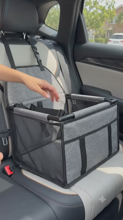 Instalacion del asiento elevado BuddyMutt: se pasa el amarre al cinturon y el perro viaja feliz